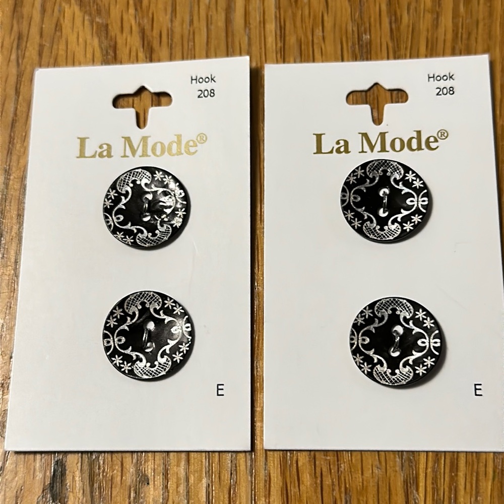 4 black with silver print buttons New - $1 if bundled